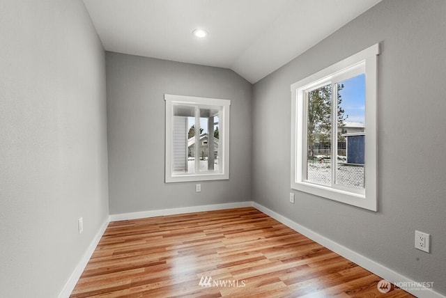 970 9th Ave, Longview, WA 98632 - unfurnished room with light wood-type flooring and vaulted ceiling