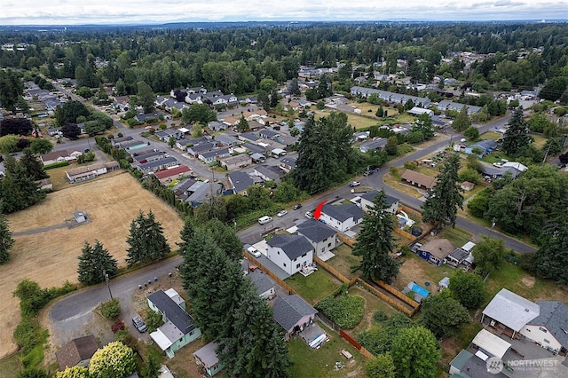 10111 12th Ave E, Tacoma, WA 98445 - aerial view of property and surrounding area with nearby suburban area