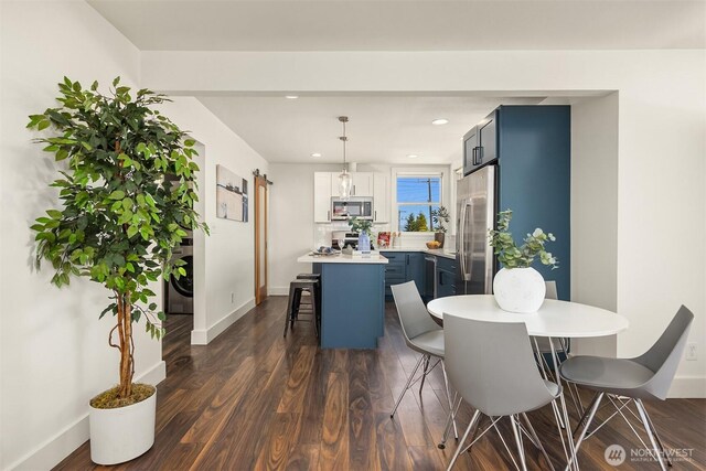 7554 34th Ave SW, Seattle, WA 98126 - dining area featuring recessed lighting and dark wood-style flooring