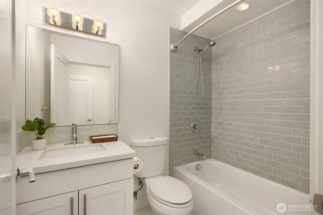 7554 34th Ave SW, Seattle, WA 98126 - full bath with vanity, shower / bathtub combination, and tasteful backsplash