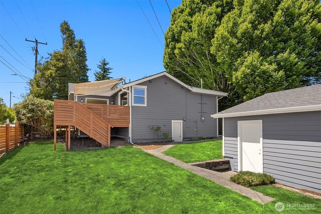 7554 34th Ave SW, Seattle, WA 98126 - rear view of property with a deck and stairs