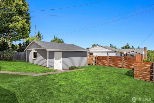 7554 34th Ave SW, Seattle, WA 98126 - fenced backyard featuring an outdoor structure