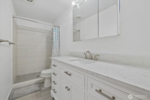 2448 NW 59th St Unit 301, Seattle, WA 98107 - full bath featuring vanity, tiled shower, and tile patterned floors