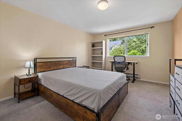 2448 NW 59th St Unit 301, Seattle, WA 98107 - bedroom with light colored carpet and a baseboard heating unit