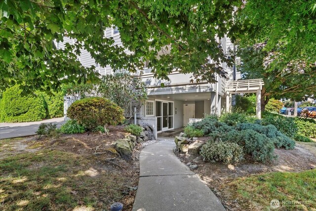2448 NW 59th St Unit 301, Seattle, WA 98107 - view of property hidden behind natural elements