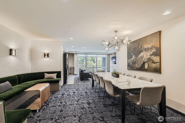 76 Cedar St Unit 806, Seattle, WA 98121 - carpeted dining area featuring a chandelier and recessed lighting