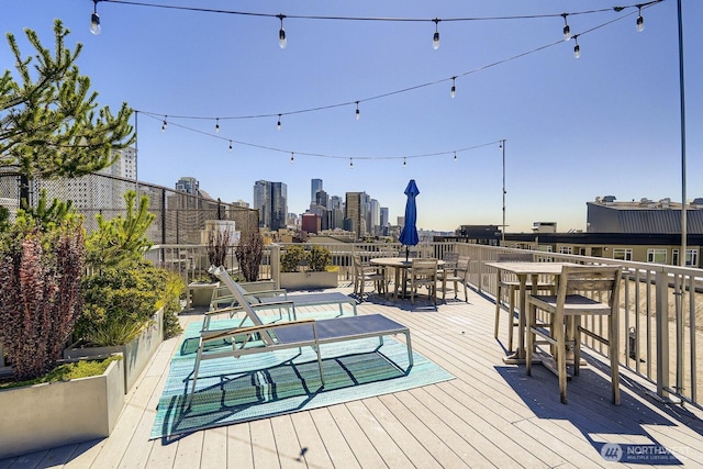 76 Cedar St Unit 806, Seattle, WA 98121 - deck featuring outdoor dining space and a skyline view