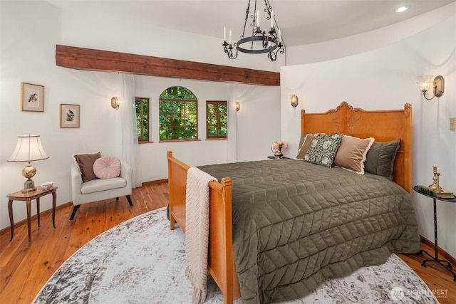 24917 Dockton Rd SW, Vashon, WA 98070 - bedroom featuring a chandelier, wood finished floors, and recessed lighting