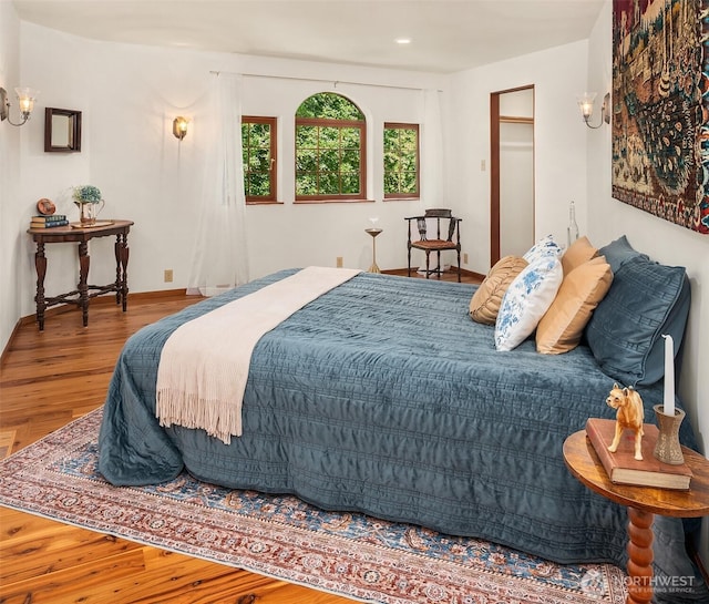 24917 Dockton Rd SW, Vashon, WA 98070 - bedroom featuring wood finished floors and recessed lighting