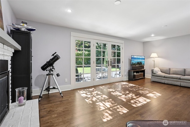 4712 90th Ave SE, Mercer Island, WA 98040 - living room featuring wood finished floors, french doors, a fireplace, and recessed lighting