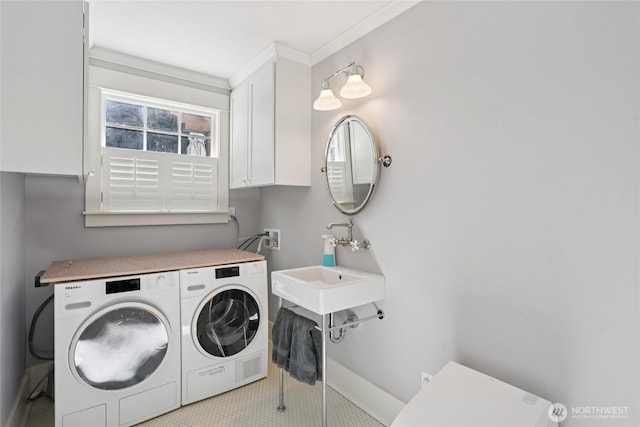 4712 90th Ave SE, Mercer Island, WA 98040 - laundry area featuring washing machine and clothes dryer, cabinet space, and crown molding