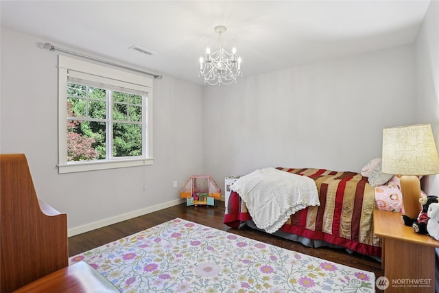 4712 90th Ave SE, Mercer Island, WA 98040 - bedroom featuring a chandelier and wood finished floors