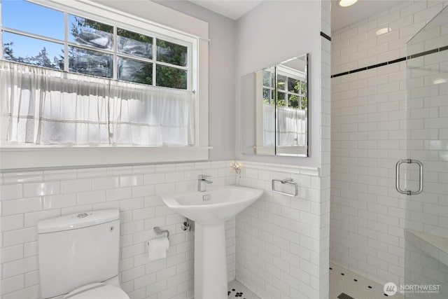 4712 90th Ave SE, Mercer Island, WA 98040 - full bathroom with a shower stall, tile walls, plenty of natural light, and wainscoting