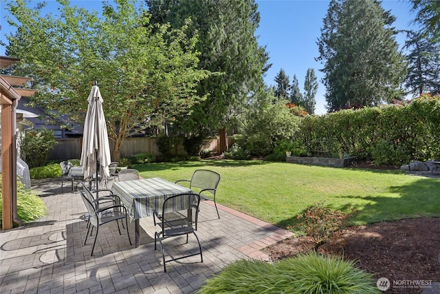 4712 90th Ave SE, Mercer Island, WA 98040 - fenced backyard with outdoor dining space and a patio area