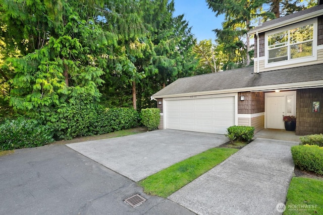 412 228th St SW Unit F101, Bothell, WA 98021 - garage with driveway