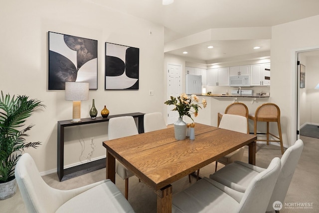 412 228th St SW Unit F101, Bothell, WA 98021 - dining area featuring recessed lighting and baseboards