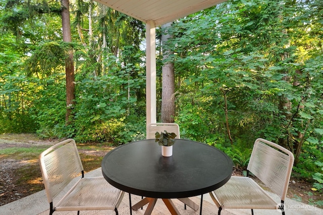 412 228th St SW Unit F101, Bothell, WA 98021 - view of patio featuring outdoor dining space