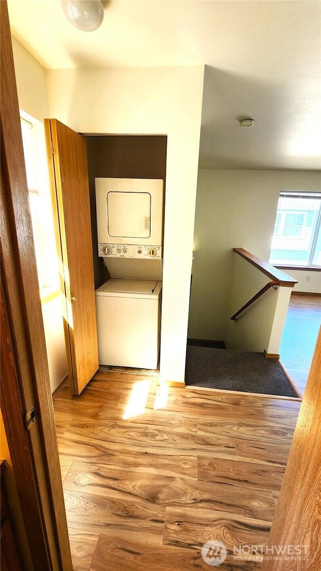 2316 Xenia St Unit 2316, Bellingham, WA 98229 - washroom featuring stacked washer and clothes dryer and wood finished floors