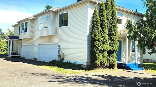 2316 Xenia St Unit 2316, Bellingham, WA 98229 - view of property exterior with an attached garage and driveway