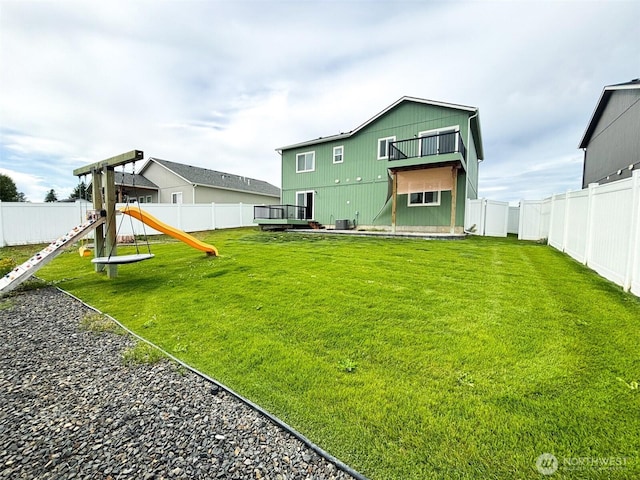 1522 E Marilyn Cir, Deer Park, WA 99006 - rear view of house featuring a fenced backyard and a wooden deck