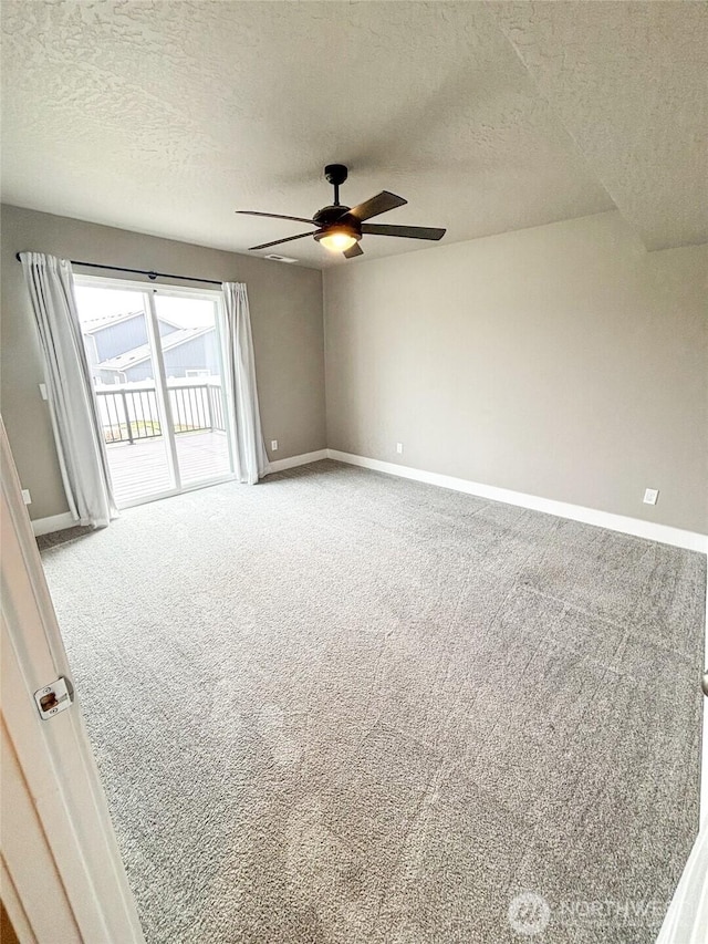 1522 E Marilyn Cir, Deer Park, WA 99006 - carpeted empty room featuring a textured ceiling and ceiling fan