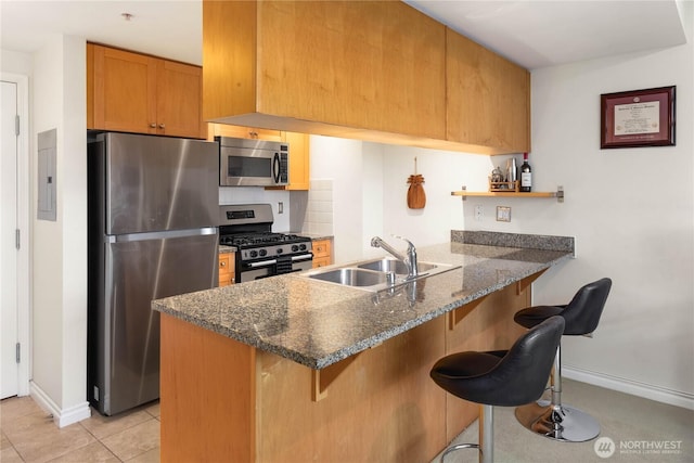 1420 Terry Ave Unit 1607, Seattle, WA 98101 - kitchen with stainless steel appliances, a peninsula, open shelves, a breakfast bar area, and electric panel