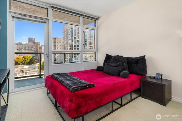 1420 Terry Ave Unit 1607, Seattle, WA 98101 - bedroom featuring a city view and carpet floors
