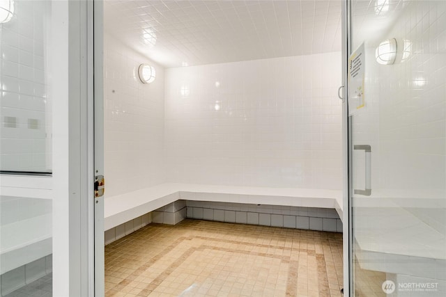 1420 Terry Ave Unit 1607, Seattle, WA 98101 - bathroom with a sauna, a stall shower, and tile patterned floors