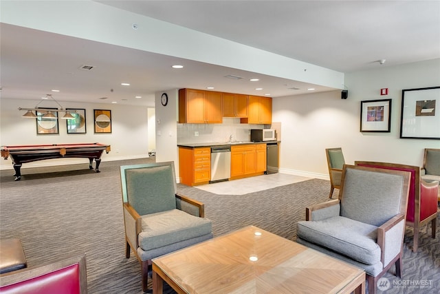 1420 Terry Ave Unit 1607, Seattle, WA 98101 - living room with recessed lighting, light colored carpet, and billiards
