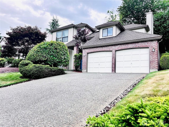 8123 129th Pl SE, Newcastle, WA 98056 - traditional-style home featuring a garage, brick siding, asphalt driveway, a chimney, and roof with shingles