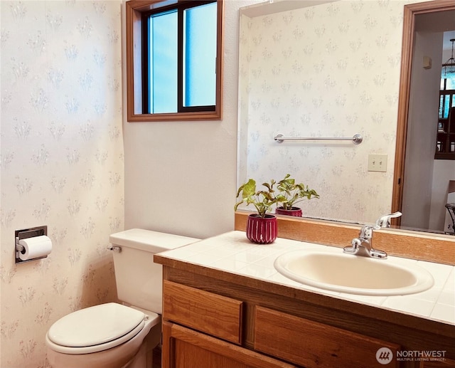 8123 129th Pl SE, Newcastle, WA 98056 - bathroom with vanity and wallpapered walls