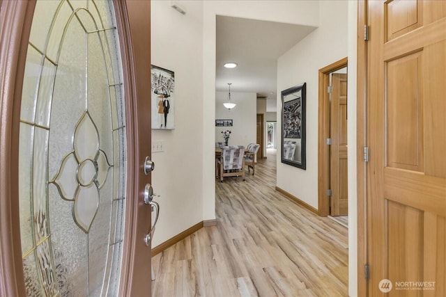 15203 148th Avenue Ct E, Orting, WA 98360 - foyer entrance with baseboards and light wood-style flooring