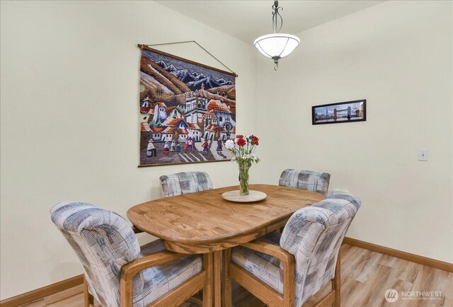 15203 148th Avenue Ct E, Orting, WA 98360 - dining area with light wood finished floors and baseboards