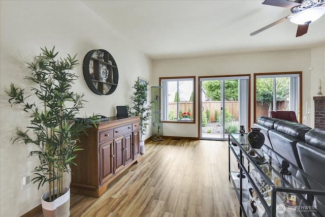 15203 148th Avenue Ct E, Orting, WA 98360 - living room featuring light wood-style flooring and ceiling fan