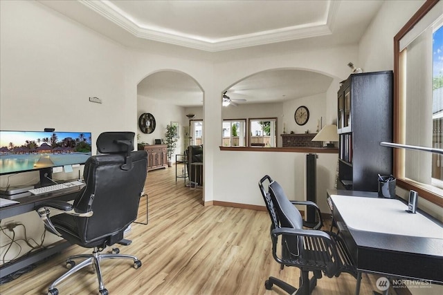 15203 148th Avenue Ct E, Orting, WA 98360 - office space with arched walkways, a raised ceiling, light wood-style floors, a ceiling fan, and crown molding