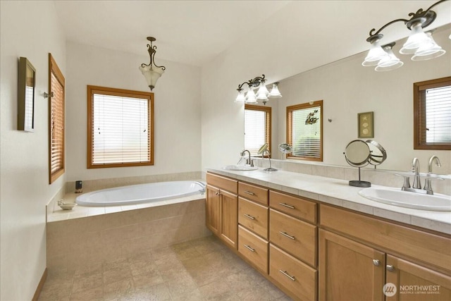 15203 148th Avenue Ct E, Orting, WA 98360 - bathroom with double vanity, a bath, and tile patterned flooring