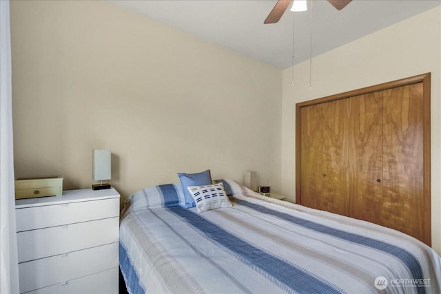 15203 148th Avenue Ct E, Orting, WA 98360 - bedroom with ceiling fan and a closet