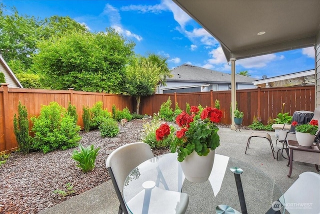 15203 148th Avenue Ct E, Orting, WA 98360 - fenced backyard featuring a patio