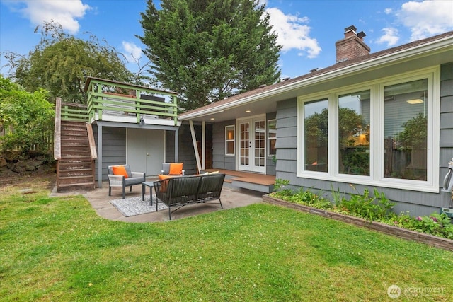 4301 1st Ave NW, Seattle, WA 98107 - rear view of property featuring french doors, stairway, a yard, and a chimney
