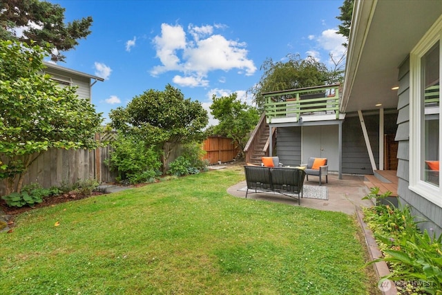 4301 1st Ave NW, Seattle, WA 98107 - fenced backyard featuring stairway, a patio, and outdoor lounge area