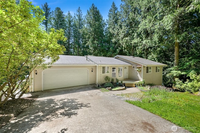 10 Cedar Pl, Bellingham, WA 98229 - ranch-style house with asphalt driveway, an attached garage, and stucco siding