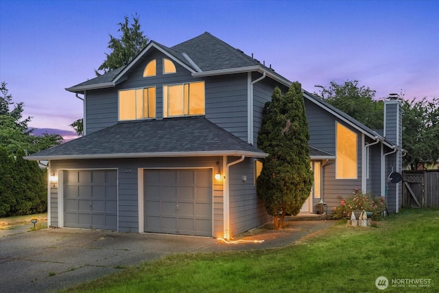 2826 NE 8th St, Renton, WA 98056 - view of front of property with an attached garage, roof with shingles, driveway, and a chimney