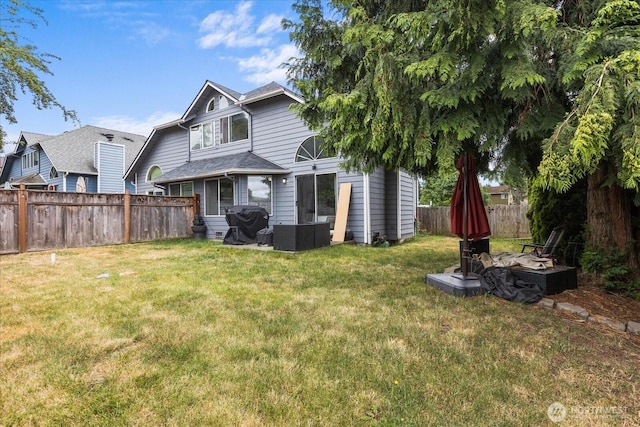 2826 NE 8th St, Renton, WA 98056 - rear view of property featuring a fenced backyard and a patio area
