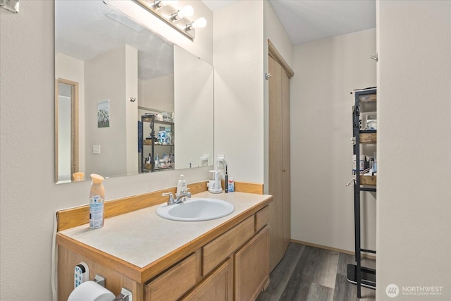 2826 NE 8th St, Renton, WA 98056 - bathroom with vanity and wood finished floors