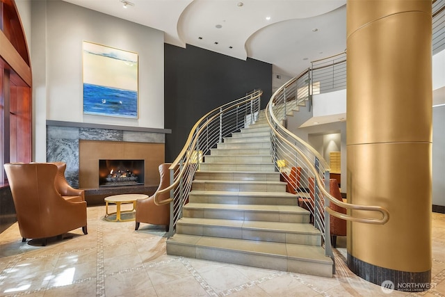 2033 2nd Ave Unit 703, Seattle, WA 98121 - staircase with a fireplace and inlaid floor details