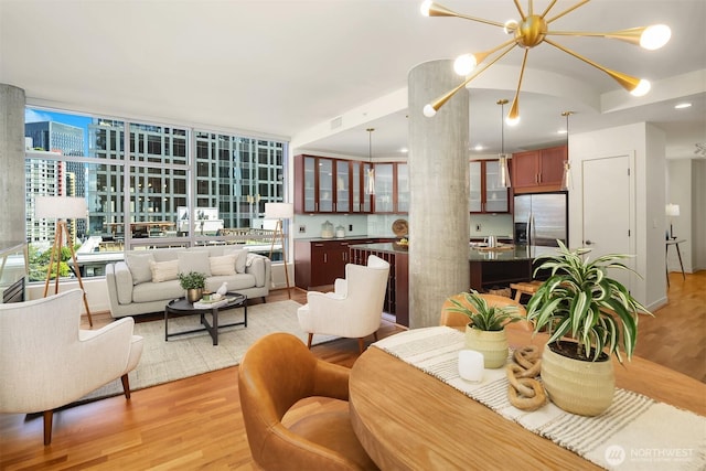 2033 2nd Ave Unit 703, Seattle, WA 98121 - living area featuring light wood finished floors