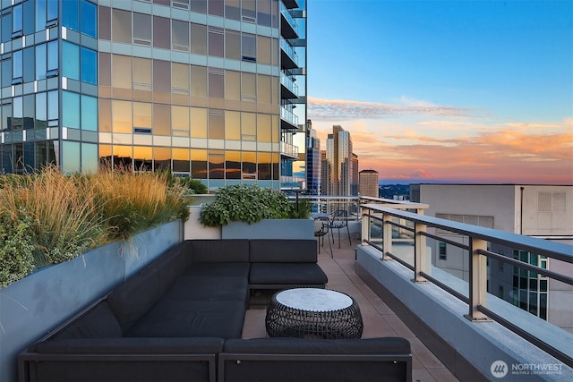 2033 2nd Ave Unit 703, Seattle, WA 98121 - balcony featuring an outdoor living space