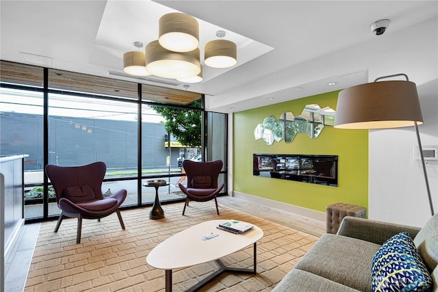 1760 NW 56th St Unit 520, Seattle, WA 98107 - living room featuring expansive windows, healthy amount of natural light, and recessed lighting