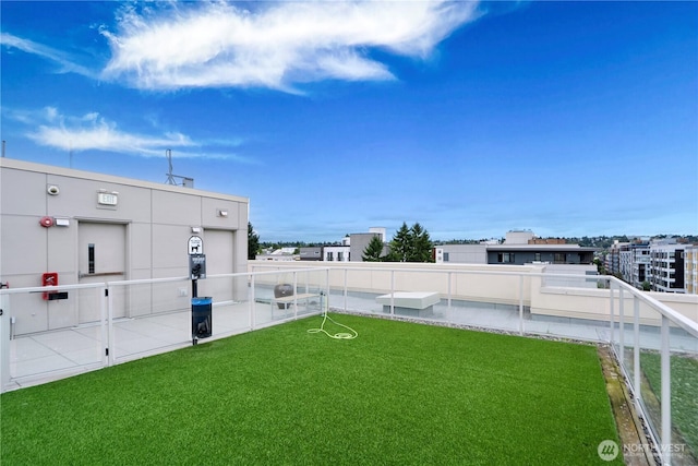 1760 NW 56th St Unit 520, Seattle, WA 98107 - view of yard with a balcony