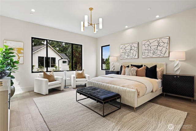 5515 108th Ave NE, Kirkland, WA 98033 - bedroom with a chandelier, wood finished floors, and recessed lighting